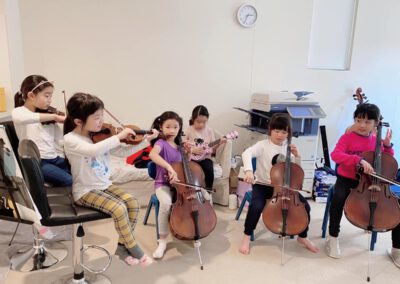 Kids playing music together.