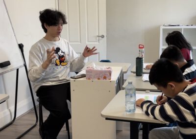 A teacher explaining things to students.